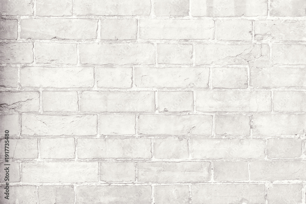 Fototapeta premium White painted brick wall texture with subtle plaster surface. Minimal neutral architectural background