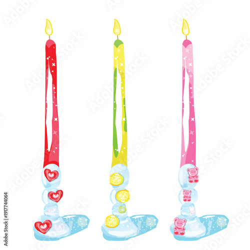 Decorative long candles set with glass holders and ornaments