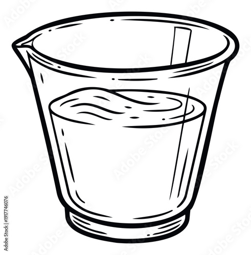 Kitchen measuring cup filled with liquid ingredient featuring a frothy top surface and internal stirring utensil, perfect for culinary and recipe content showcasing cooking and baking