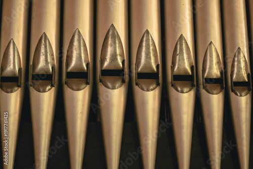 Obraz na plátne An extra-close shot of old brass organ pipes