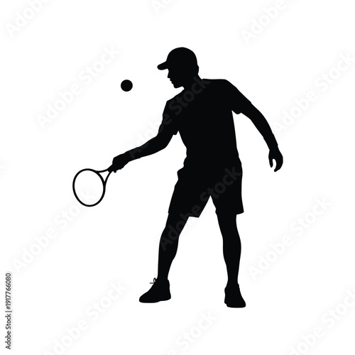 A silhouetted tennis player prepares to strike a ball during a match