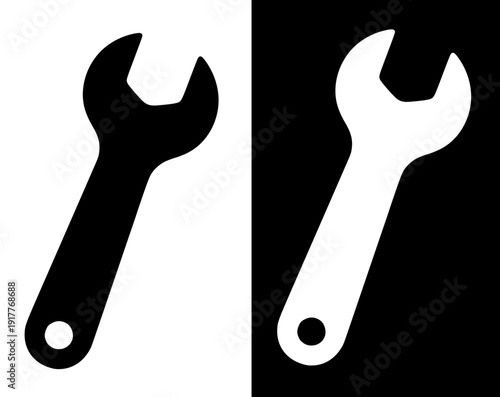 Industrial icon, vector illustration of a wrench, with silhouette design in original and negative versions.