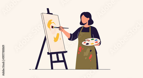 Creative female artist bringing vibrant colors to life on canvas with a paintbrush and palette