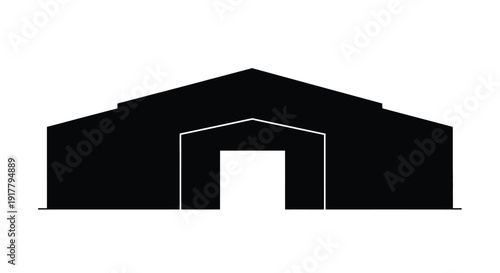 Simple black building facade with arched doorway a striking silhouette
