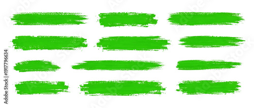 Vibrant green brush stroke text box set. Dry brush paint highlight stripes with grunge texture. Acrylic or gouache banner labels collection