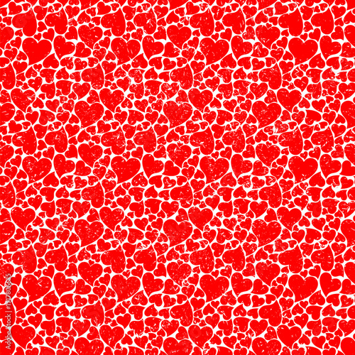 Seamless background with red hearts.