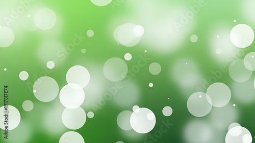 Green background with white circles of various sizes bokeh