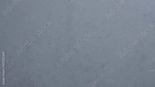 Obraz na plátně Grey plastic plate texture background with scratched rubber surface