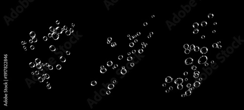 Foto Air bubbles isolated on black background with underwater oxygen effect