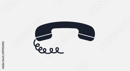 Black Landline Telephone Receiver with Cord.