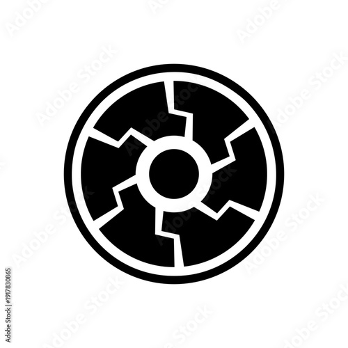 Abstract black and white circular design with jagged, fractured segments pointing towards a central point, creating a broken gear or shield-like appearance.