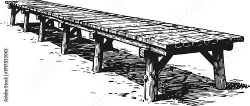 Long wooden pier extending over the water with visible planks and support beams
