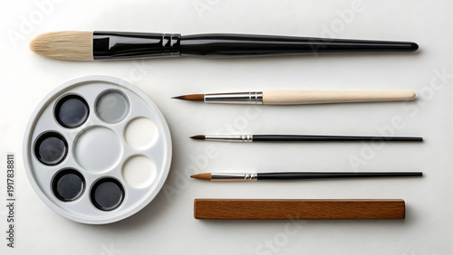 Wallpaper Mural Assorted artist brushes and paint palette for creative painting projects Torontodigital.ca