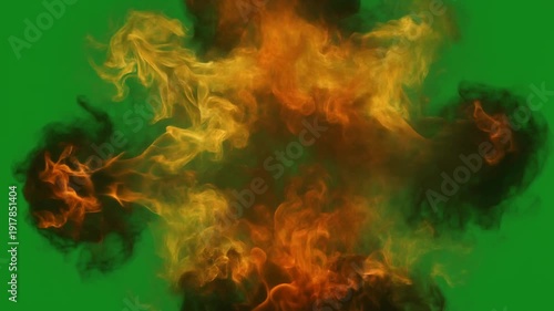 Intense spherical orange and yellow fire explosion effect creating a massive dynamic burst of heat and smoke centered against a bright chroma key green screen background