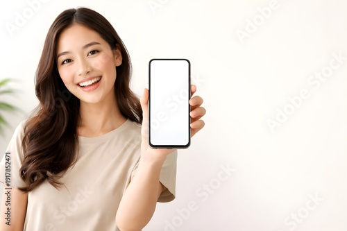 woman holding mobile phone with empty display for advertising Design