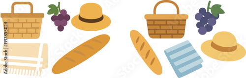 A delightful assortment of picnic items is arranged, showcasing a woven basket, fresh grapes, a crusty baguette, a sun hat, and a cozy blanket, perfect for enjoying a sunny day outside.