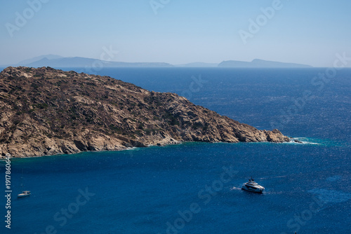 Billede på lærred View of a yacht and another boat at the marvellous Mylopotas beach in Ios Greece
