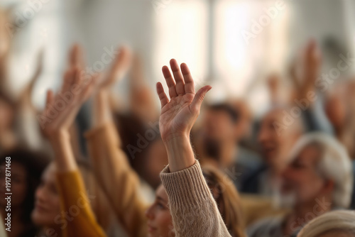 Community Hall Gathering Engaged Audience Raising Hands in