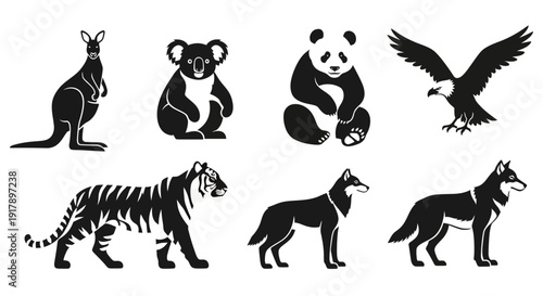 Black Silhouette Icons of Diverse Wild Animals Kangaroo Koala Panda Eagle Tiger Husky.