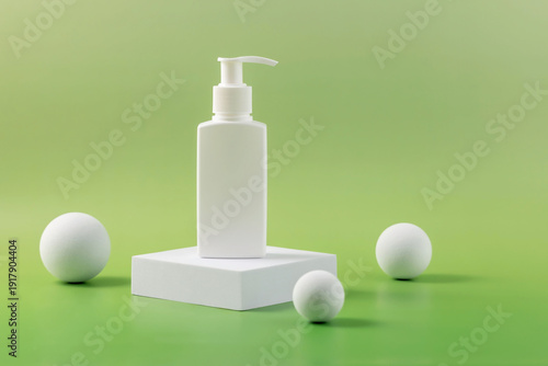 bottle dispenser of cosmetics for skin care and geometric shapes on a green background