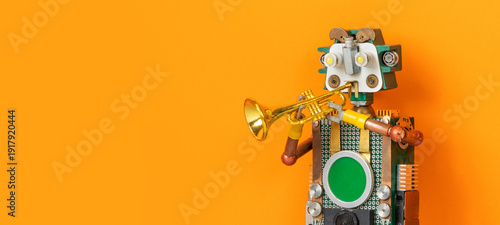 Canvas Print Gentle concentrated robot trumpeter performing solo on gold trumpet, orange backdrop with text space