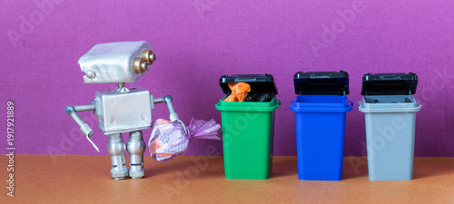 Φωτογραφία Silver robot kid recycler refuse sorter holding trash bag looking at three waste bins, selecting where to dispose