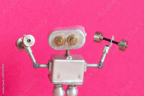 Metallic robot holding two dumbbells, close-up portrait. Fitness equipment concept, sports training flyer