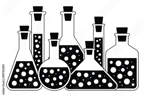 Collection of Corked Laboratory Glassware Filled with Bubbling Liquids