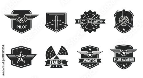 A collection of eight aviation-themed badges featuring wings, planes, propellers, and stars