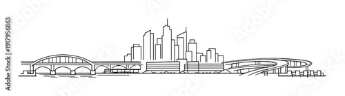 City skyline with bridges and elevated highway along waterfront