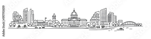 City skyline with domed building and riverside promenade