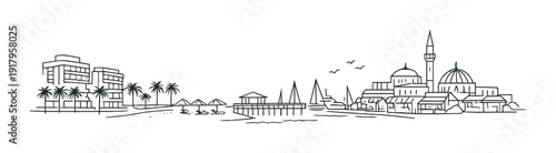 Coastal town with pier and palm lined beach waterfront