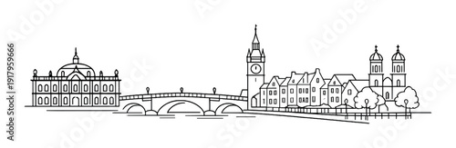 Riverside town skyline with clock tower and illuminated houses