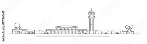 Airport terminal with control tower and multiple aircraft on apron