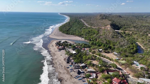 Explore a beach with palm trees and waves in Nicaragua