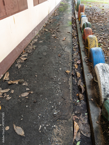Recycled Tire Safety Bumper in School Playground.