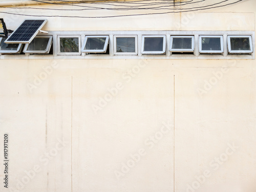 Row of Ventilation Windows on Hospital Building Wall.