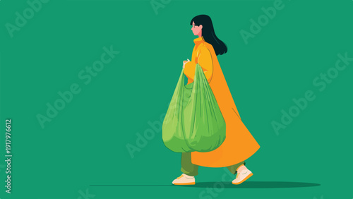 Woman in yellow coat walks carrying a large green bag on a green background