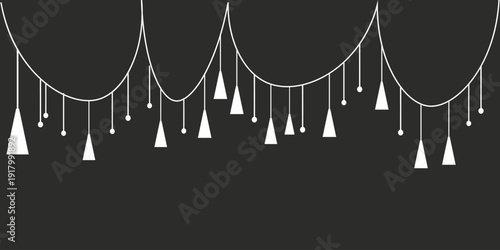 Elegant white tassel garland on dark background