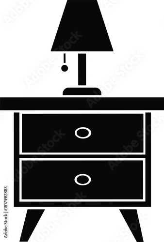 Simple black and white nightstand with lamp