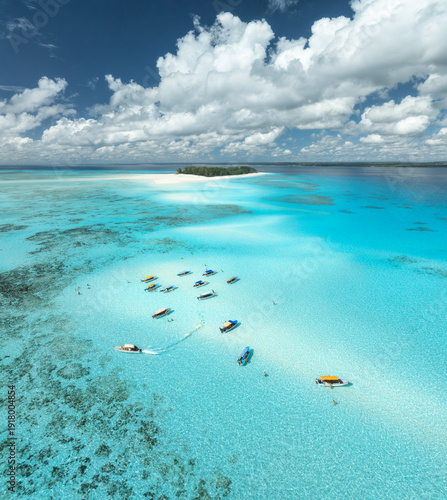 Canvas Print Aerial view of tropical sandbank, sea, tourist boats in turquoise water near Mnemba Island, Zanzibar, Tanzania