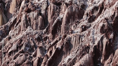 Colorful salt mountains on Hormuz Island in Iran, known as the Rainbow Island, featuring surreal mineral Martian landscape and vivid natural patterns in Persian Gulf. Unique geological formations and 