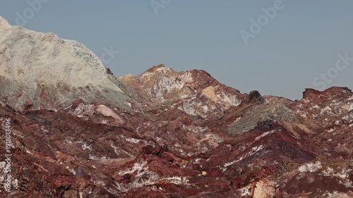 Colorful salt mountains on Hormuz Island in Iran, known as the Rainbow Island, featuring surreal mineral Martian landscape and vivid natural patterns in Persian Gulf. Unique geological formations and 