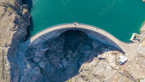 Zenithal drone view of Agua del Toro dam: A perfect symmetrical double-curvature arch dam in Mendoza, Argentina.