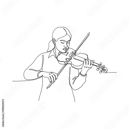 Serene woman playing beautiful music on her violin with elegance