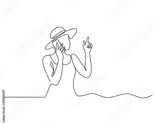 Woman wearing a sun hat talking on a mobile phone Happy Summer concept 