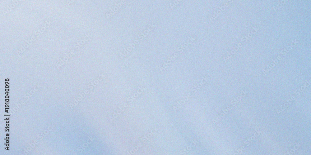Obraz premium Light blue textured background with fine grain and soft hues