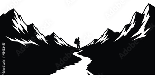 Hiker with backpack walking through mountain pass