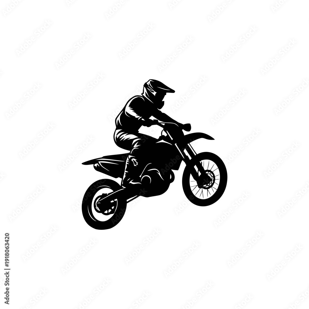 Naklejka premium Silhouette of a motocross rider in action on a dirt bike.