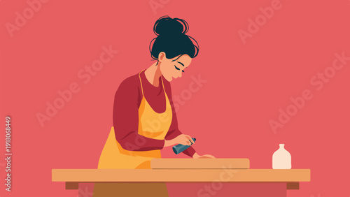 Woman in apron crafting with a tool on a wooden surface